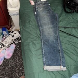 1/25 Judy blue dark jeans. Distressing on one leg